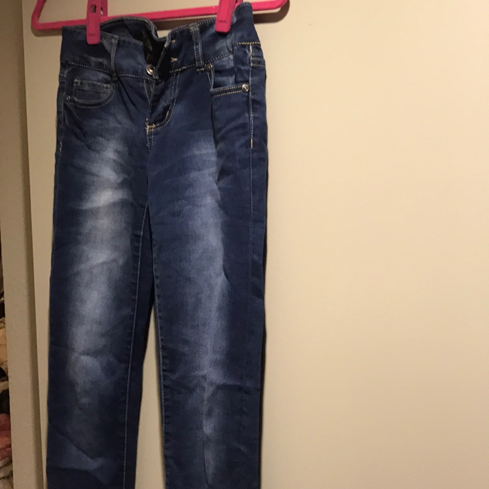 Faded dark denim jeans